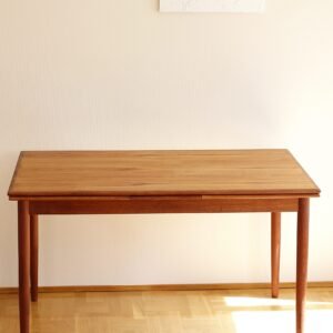 Danish extendable teak dining table. The table originates from 1960s EN Møbler, Denmark