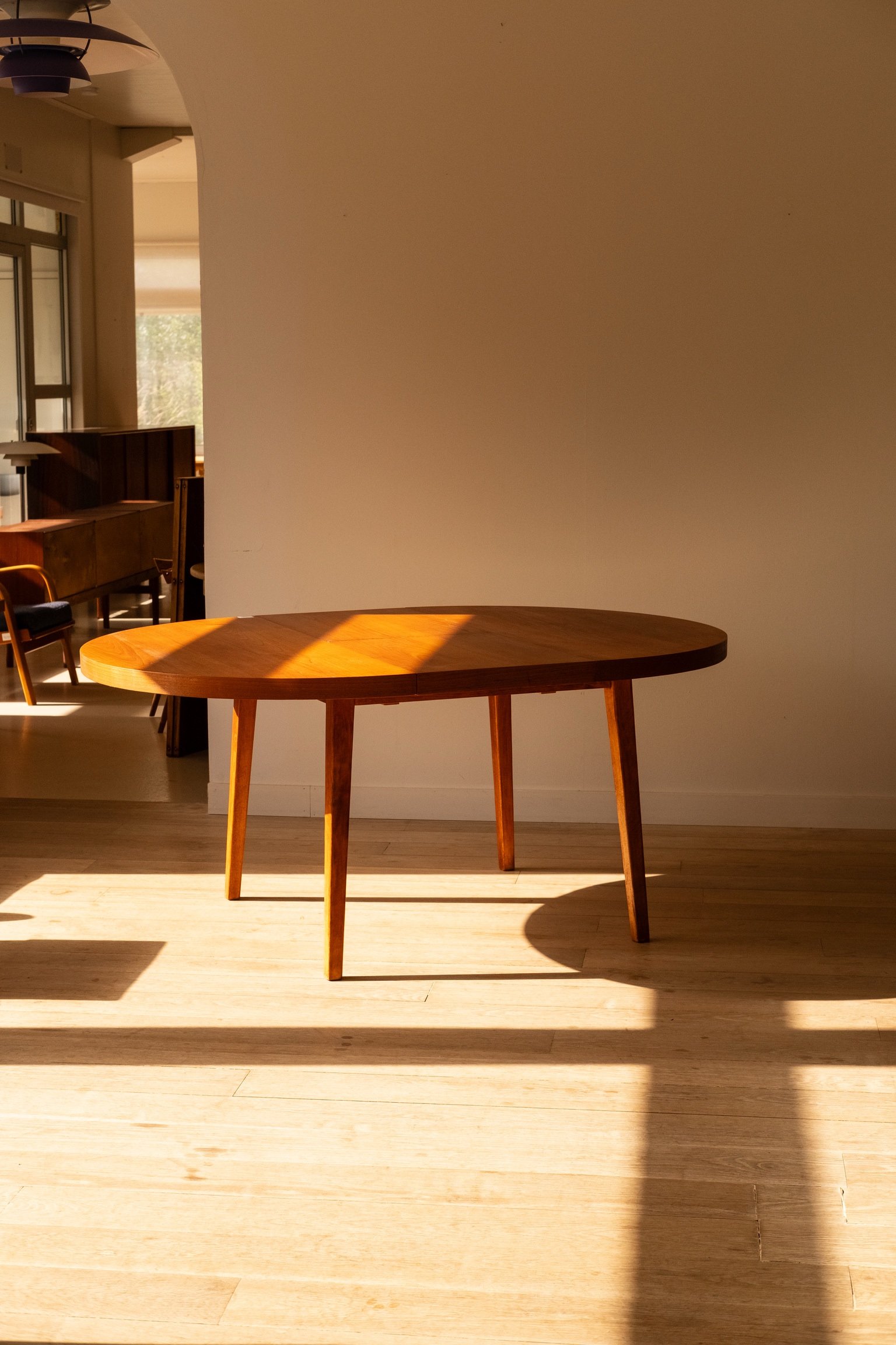 Finnish Round Extendable Teak Dining Table